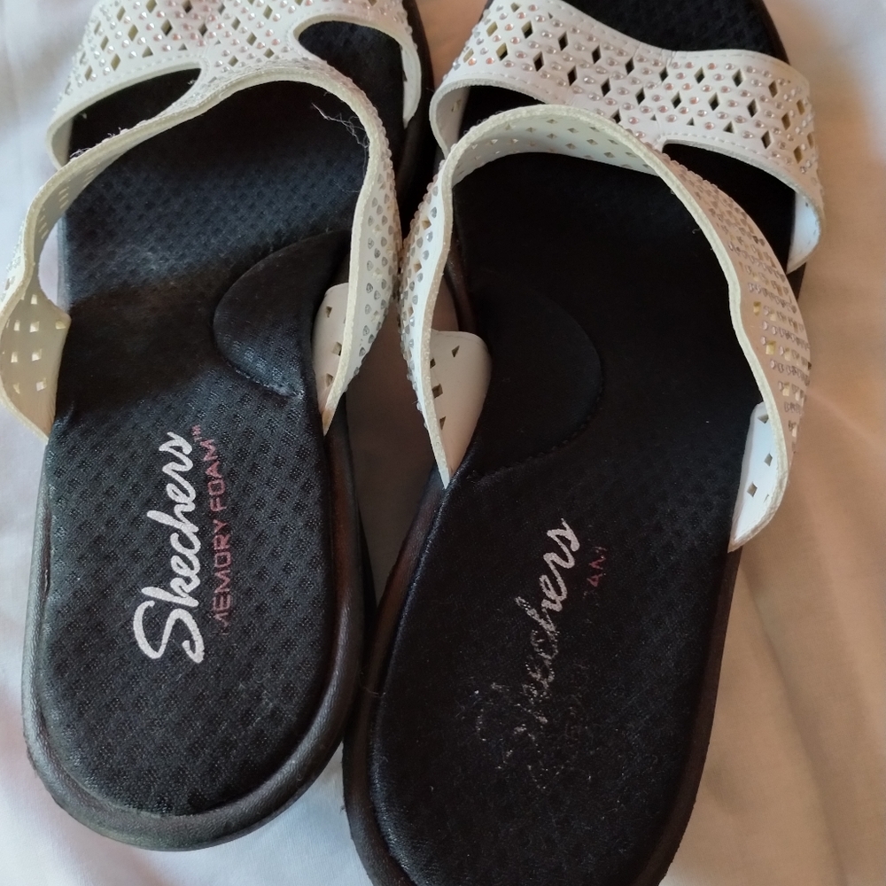 Sketchers sandals.